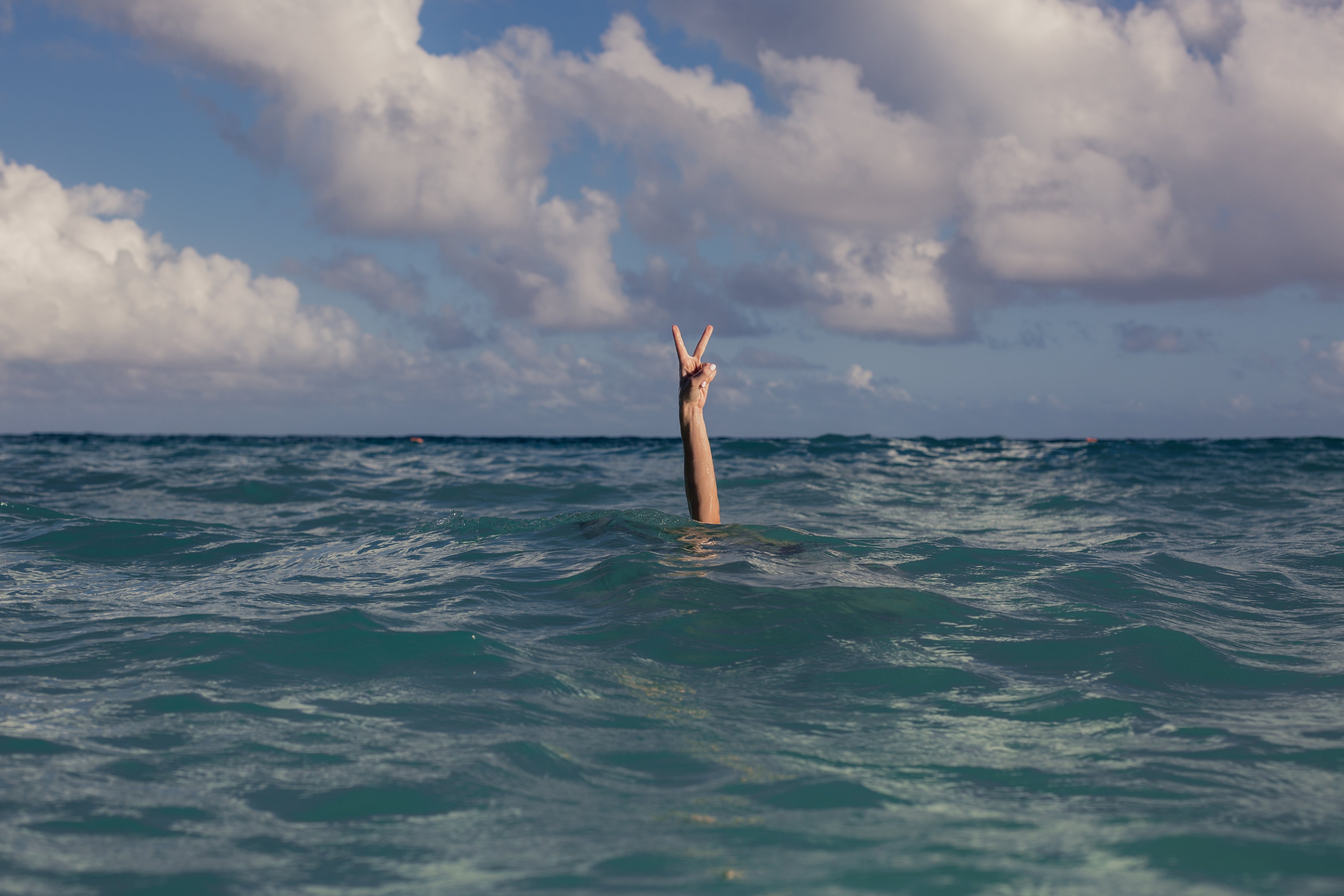 vacation-peace-sign-in-ocean.jpg