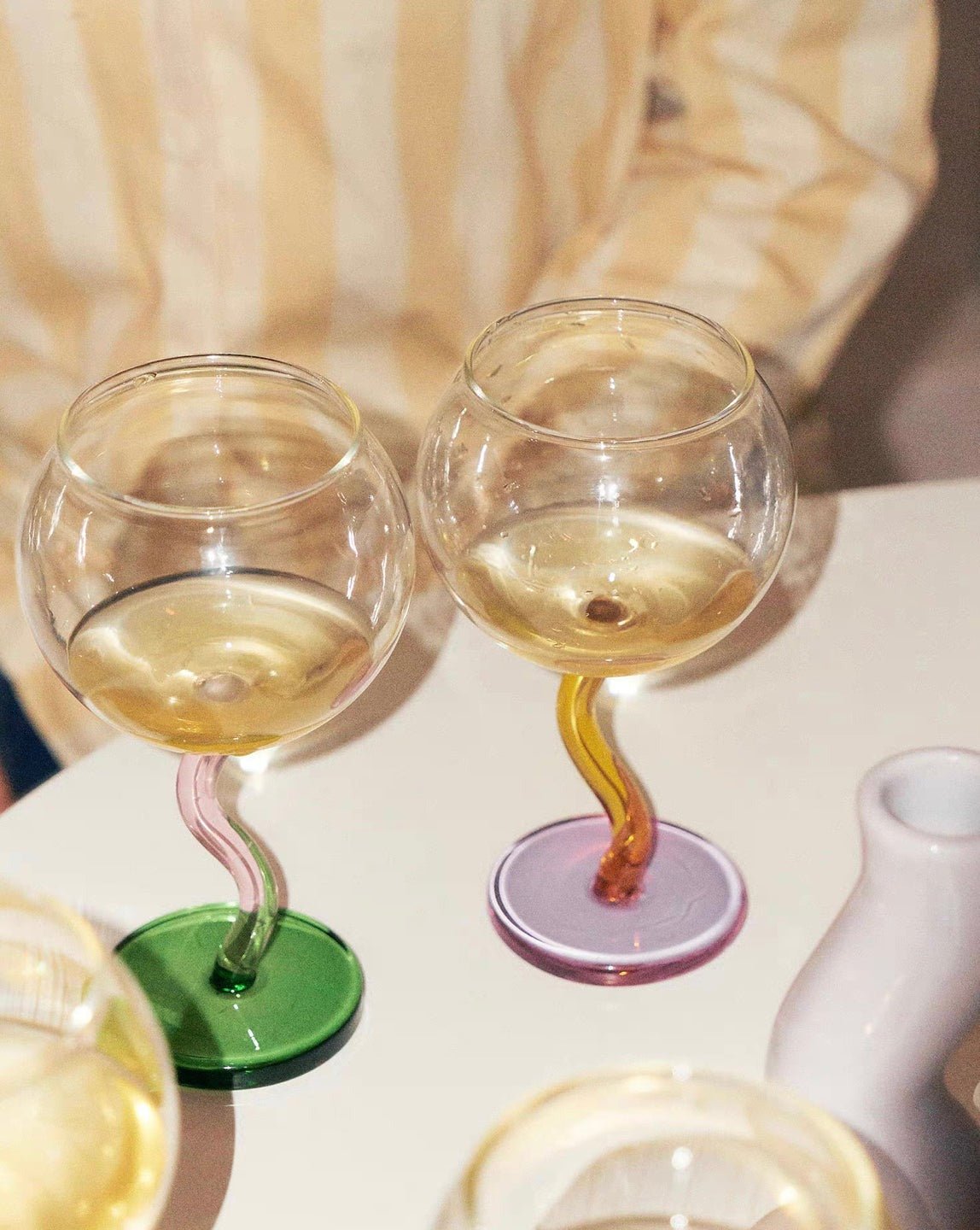 Wine Glasses With Weirdly Wobbling Stems